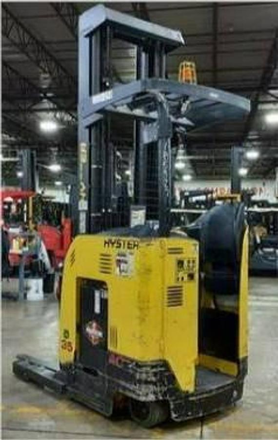 Rear opposite side view of refurbished 2018 Hyster N35ZR2 electric reach truck showing counterweight, operator compartment, 272" mast, reach carriage, cushion tires, and CSA certification decal during Ontario deployment.