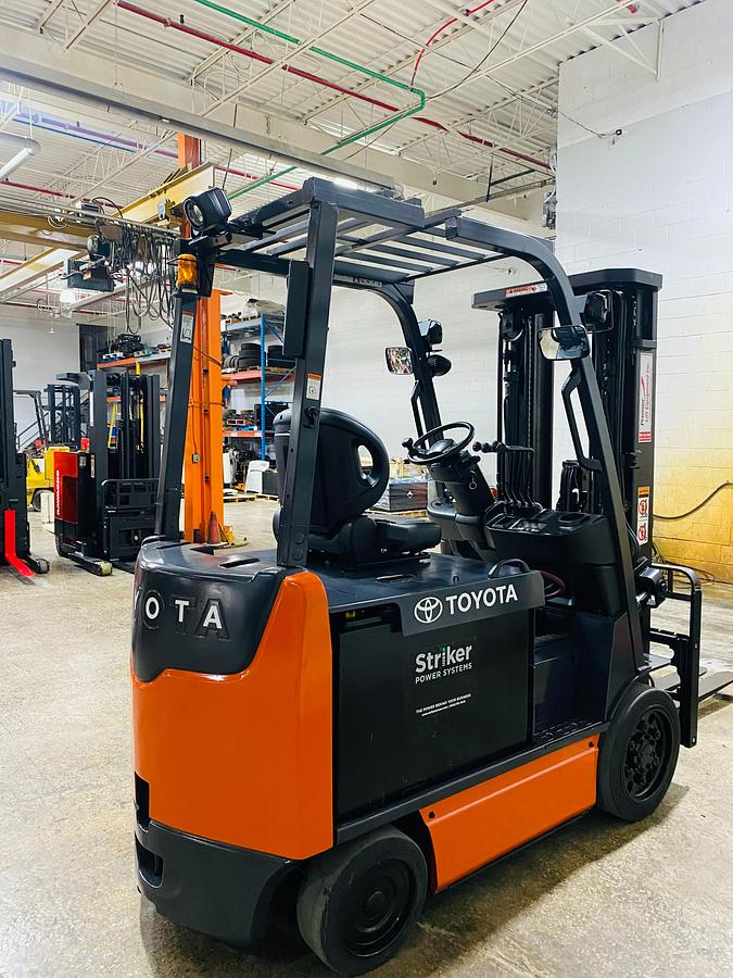 Toyota 8FBCU32 – rear angle view – counterweight, clamp-ready hydraulic ports, and CSA safety decals – CSA/MOL electric forklift – Brampton ON