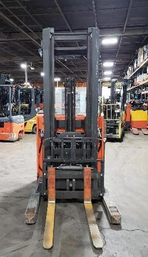 Front view of 2020 Toyota 9BDRU15 deep reach forklift showing forks, 216" triple mast, reach carriage, and overhead guard
