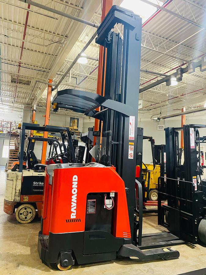 Budget Raymond 750R45TT reach truck — 4,500 lb capacity, 248” mast, 36V electric, side shift.