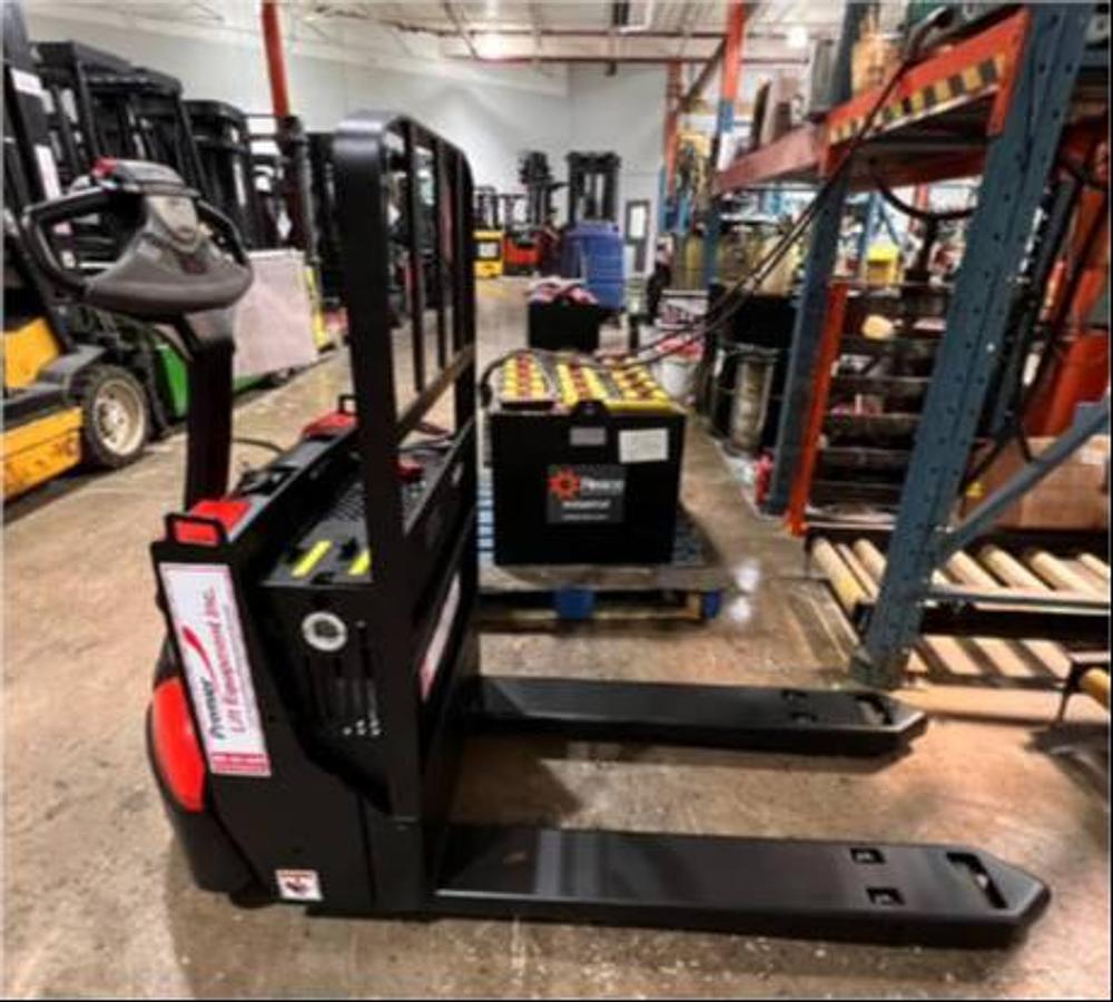 Raymond 8210 – full side profile – tapered forks, compact chassis, and tiller controls – CSA/MOL certified electric walkie pallet jack – Brampton ON