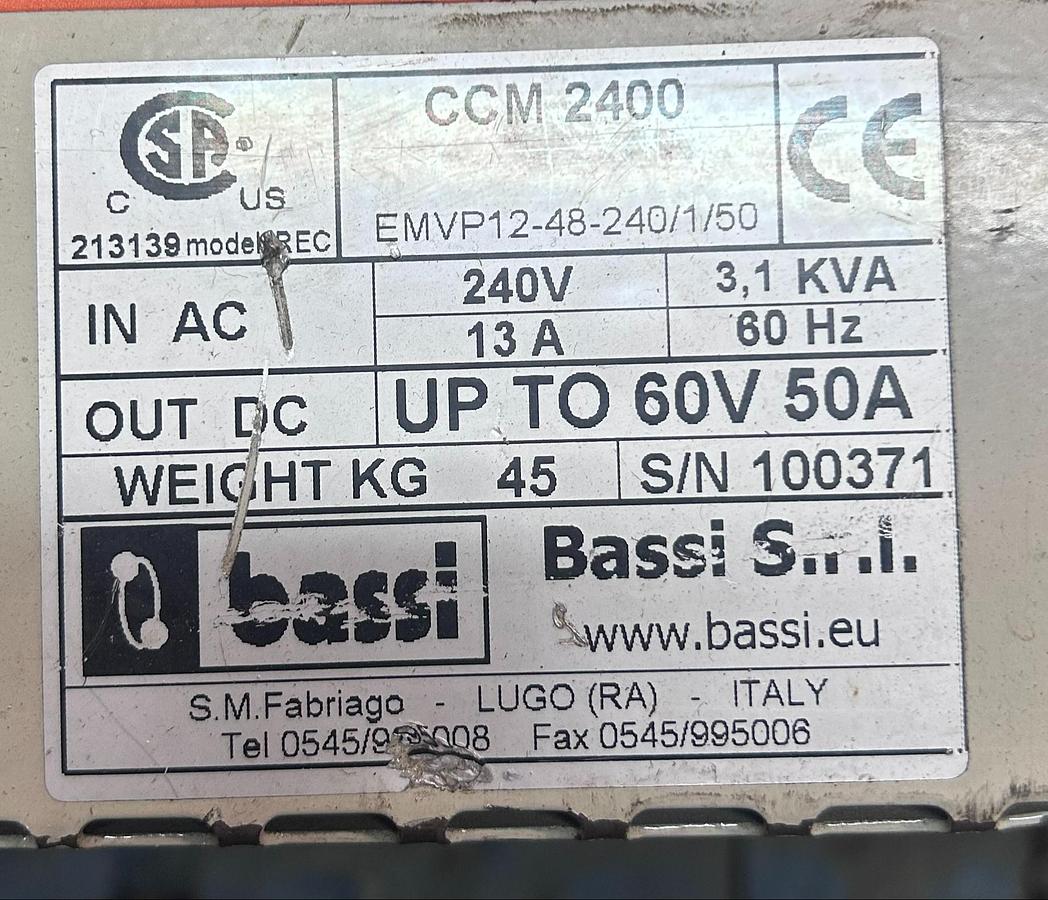 “Bassi EMVP124‑48‑240 dataplate showing multi‑voltage output, 50A rating, and 240V single‑phase input.”
