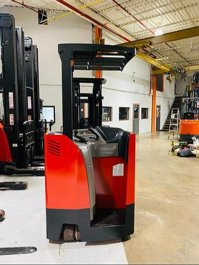 Rear view of Raymond 425-C35TT showing operator compartment, backrest, control panel, and CSA safety decals