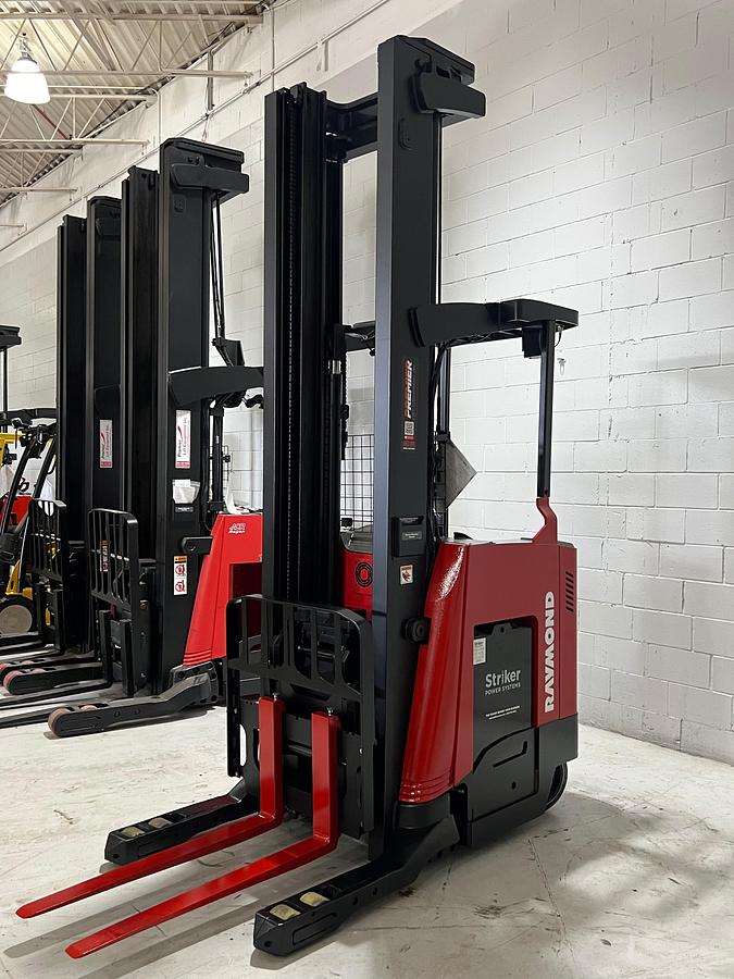 Opposite Front angled view showing mast rails and 42” fork tips