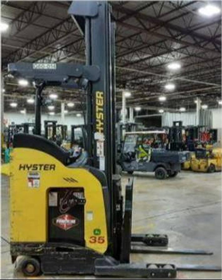 Side view of refurbished 2018 Hyster N35ZR2 electric reach truck showing 272" mast, reach carriage, cushion tires, and CSA certification decal during Ontario deployment.