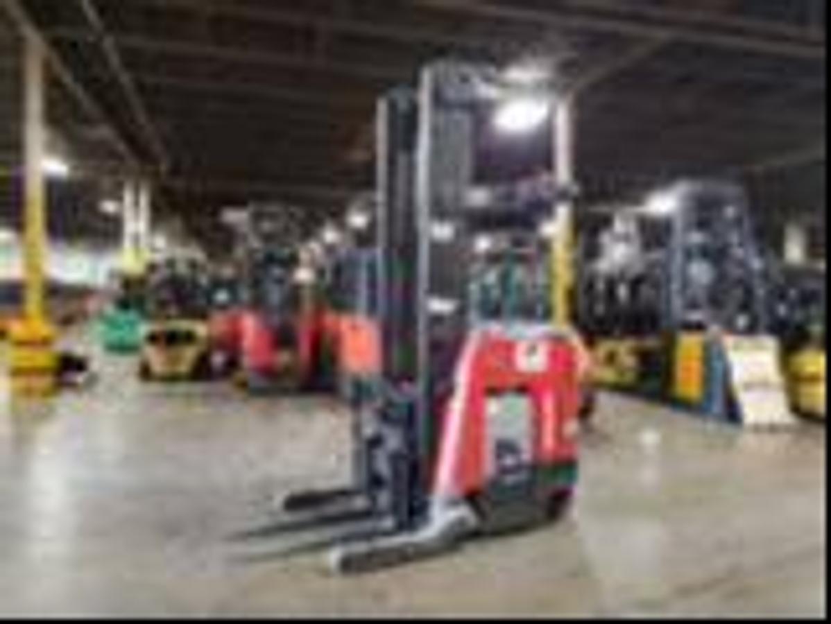 Pre-refurbishment image of 2016 Raymond 750-R45TT electric reach truck prior to CSA certification and repainting, later deployed in Mississauga