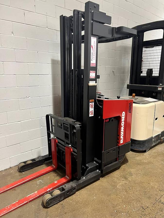 Refurbished 1999 Raymond EASIR30TT electric reach truck with CSA certification and 36V battery deployed in Mississauga for narrow aisle warehouse operations