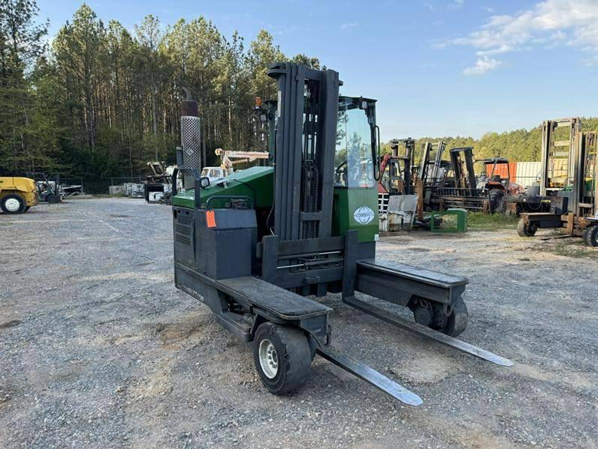 Front view of refurbished 2012 Combilift C10000XL LP Gas multi‑directional forklift showing fork positioner, 78" forks, 217" mast, and CSA certification decal during Ontario deployment.