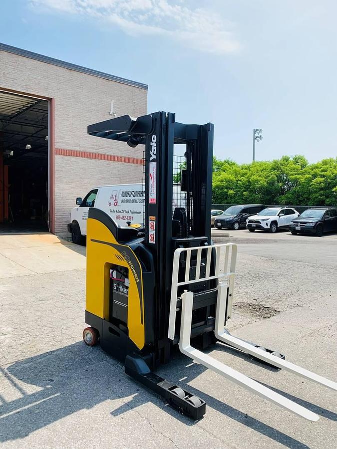 Front angled view showing mast rails and compact chassis profile