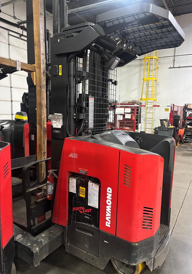 Opposite rear‑side angle of the Raymond 731‑4D‑R45TT four‑directional forklift showing baseleg opening and rear chassis structure