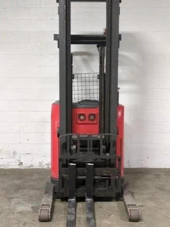 Front angled view showing mast rails and 42” fork tips