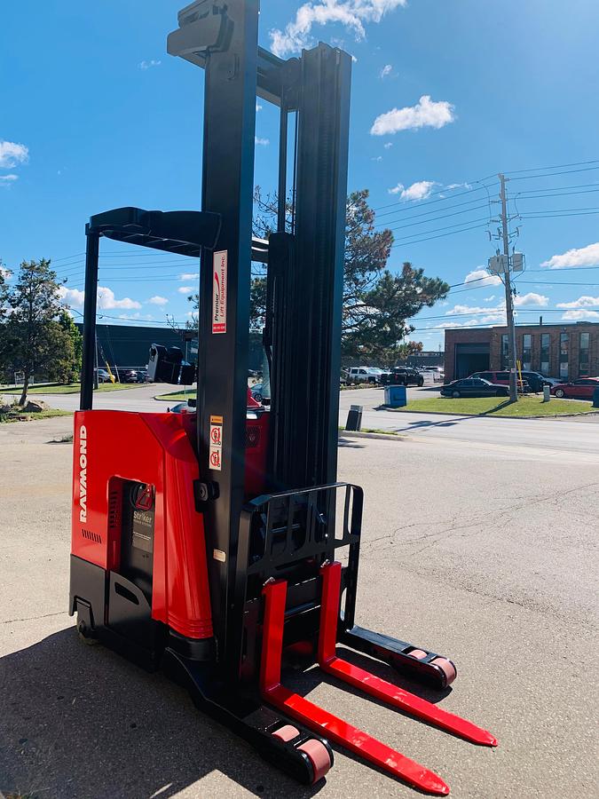 Opposite Front angled view showing mast rails and 42” fork tips
