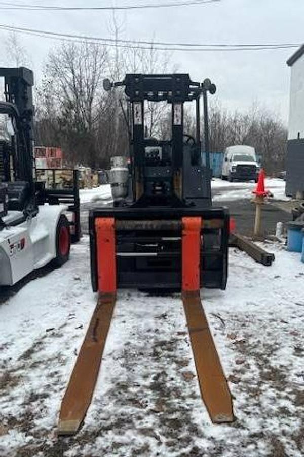 Front view of 2019 Toyota THD3000-24 propane forklift showing extended forks, mast carriage, dual cushion tires, and CSA-certified chassis – unit staged in Brampton ON