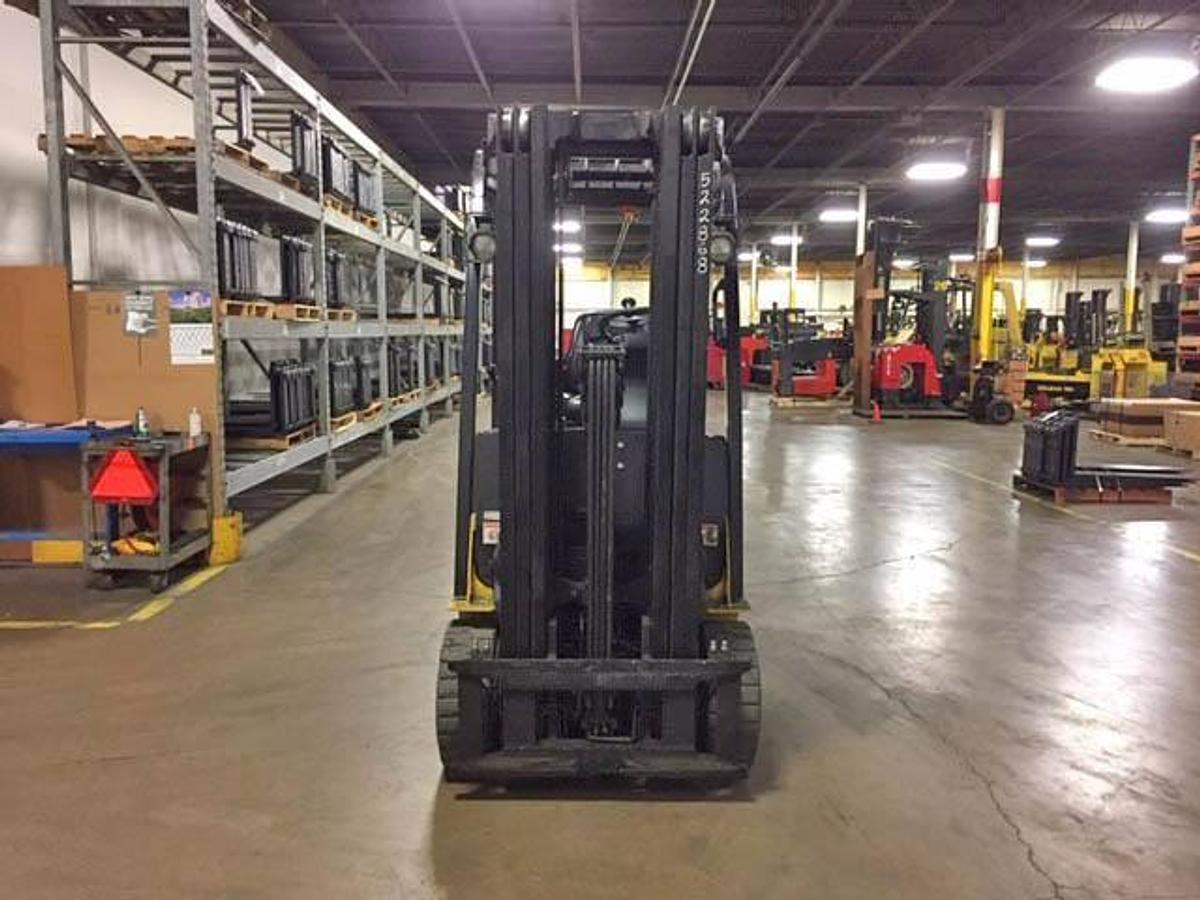 Front view of refurbished 2016 Yale ERC050VGN electric forklift showing mast, carriage, and solid pneumatic tires during Brampton deployment