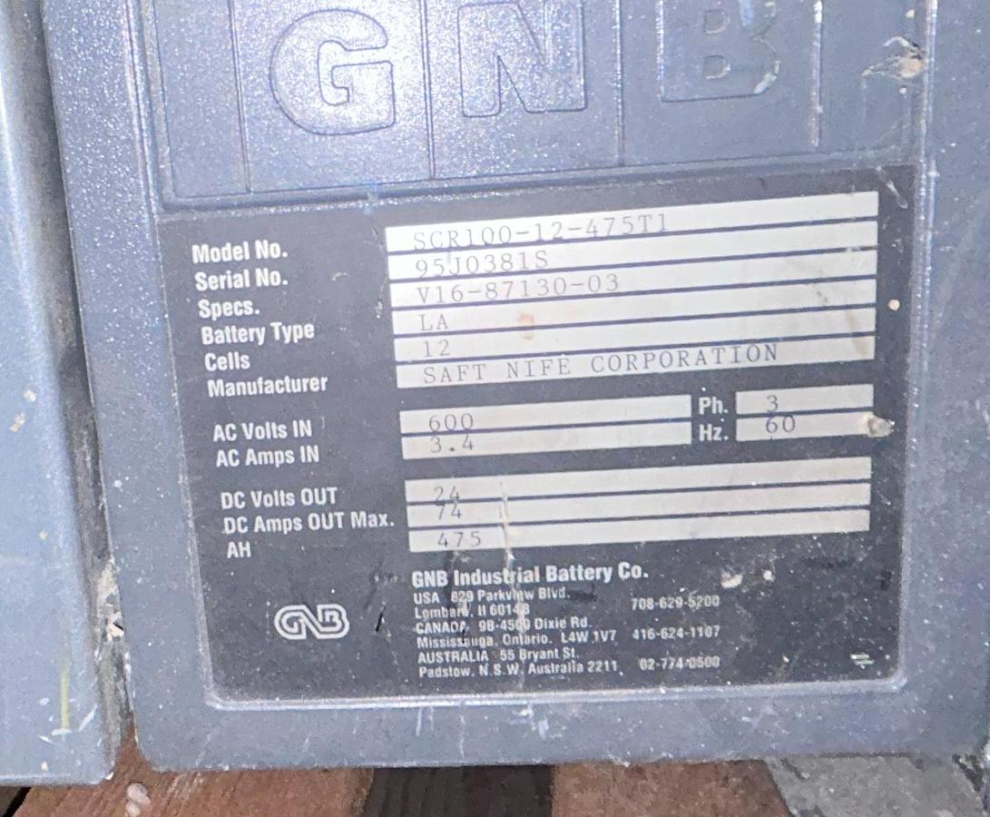 “GNB charger dataplate showing model SGR100‑12‑475TJ, serial 906808R1S, 12‑cell lead‑acid specs, and 208V 3‑phase input.”