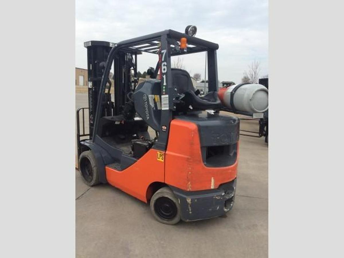 Rear side angle of refurbished Toyota LP gas forklift showing counterweight, rear chassis, and CSA decal during Brampton deployment