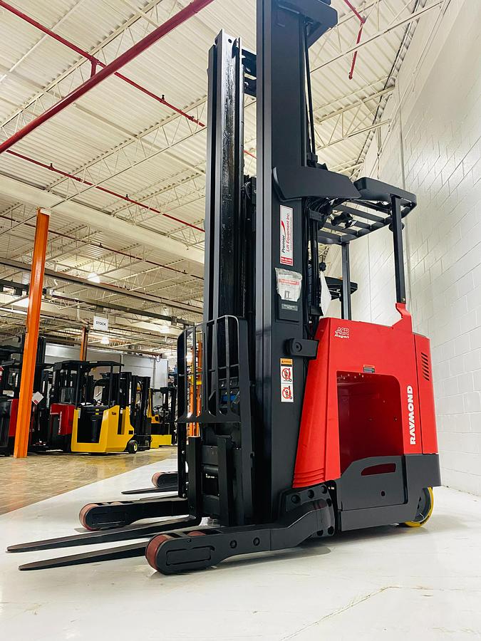 Refurbished 2021 Raymond 752-R45TT electric reach truck with CSA certification and new paint deployed in Mississauga for narrow aisle warehouse operations