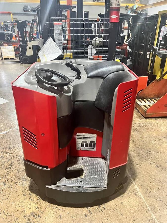 Operator compartment view showing stand-up controls and ergonomic handle