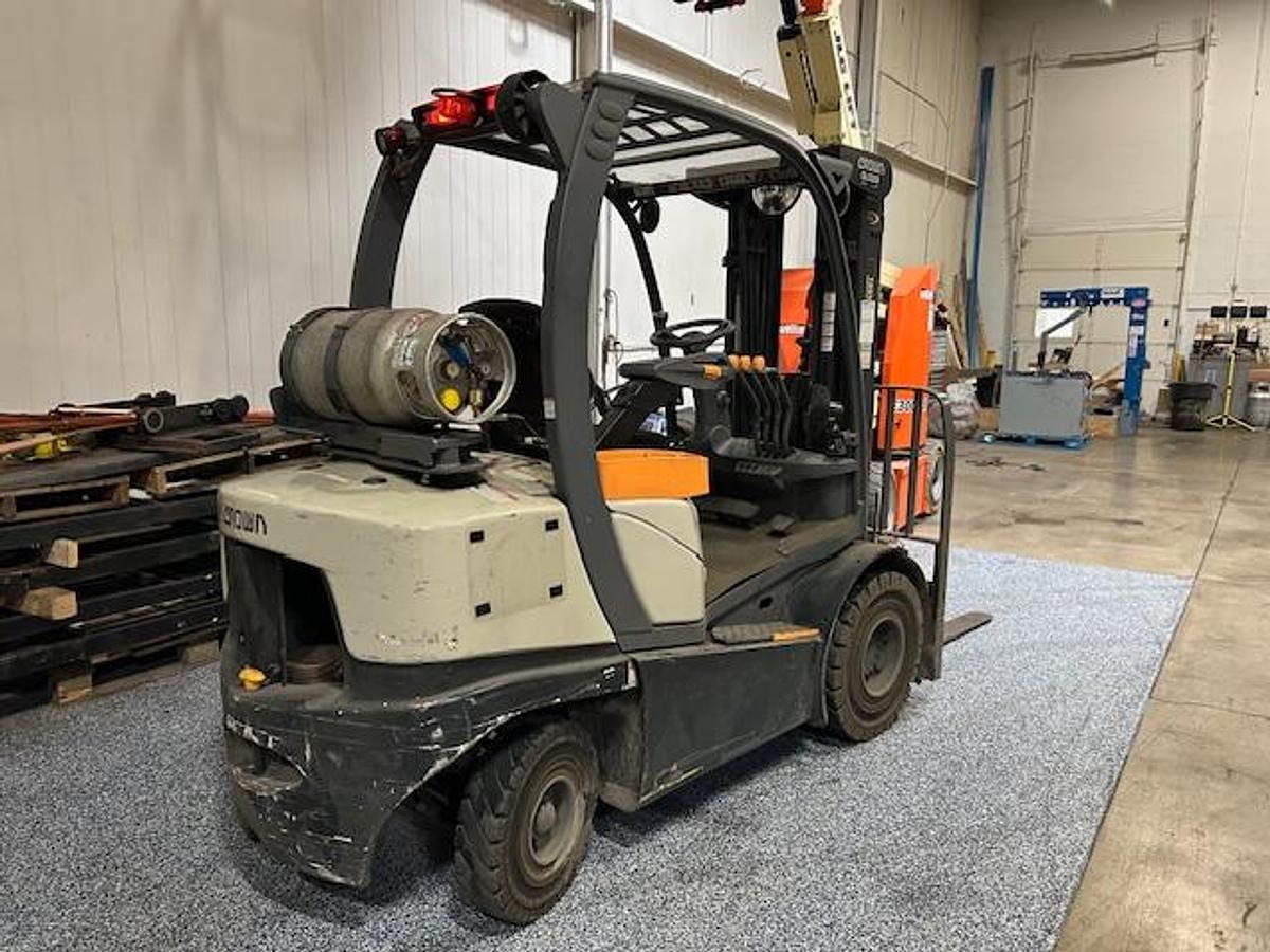 Opposite rear side angle view of Crown C5-1050-50 propane forklift – CSA-certified 5,000 lb outdoor unit with overhead guard, tapered forks, and clamp-ready hydraulics – Premier Lift Equipment Brampton ON