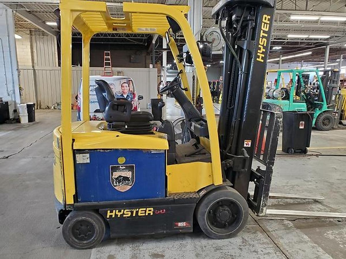 Hyster E50XN – full side profile – triple mast, cushion tires, and fork positioner – CSA electric forklift – Brampton ON