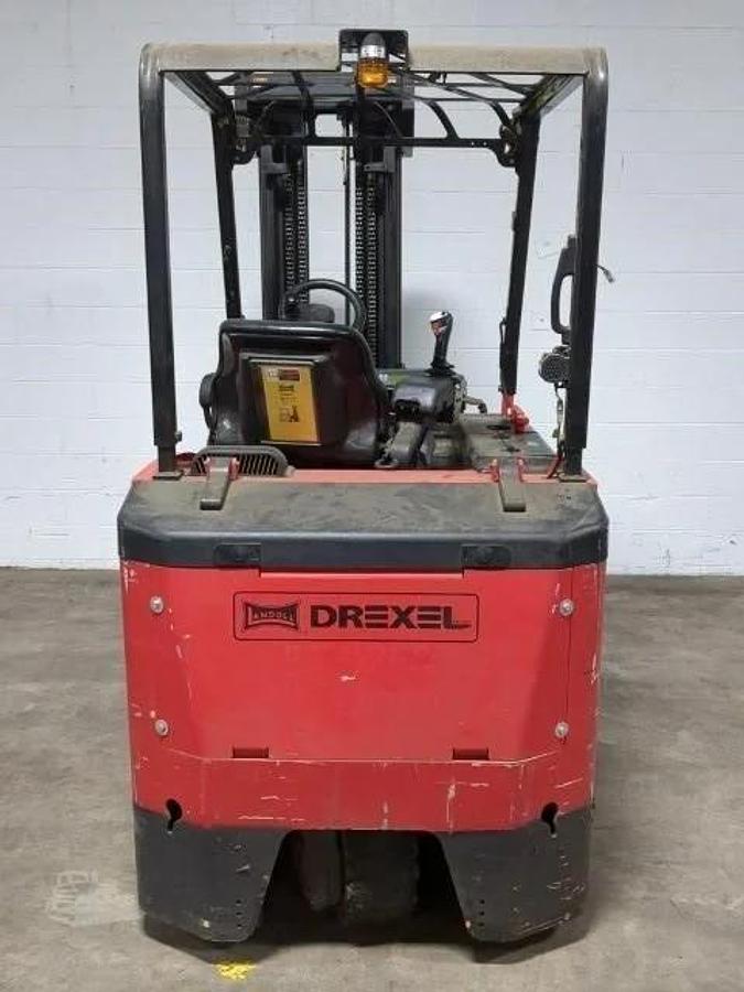 Rear view of Drexel SLT35AC operator compartment showing stand-up platform, ergonomic joystick controls, and overhead guard – CSA certified VNA swing mast forklift