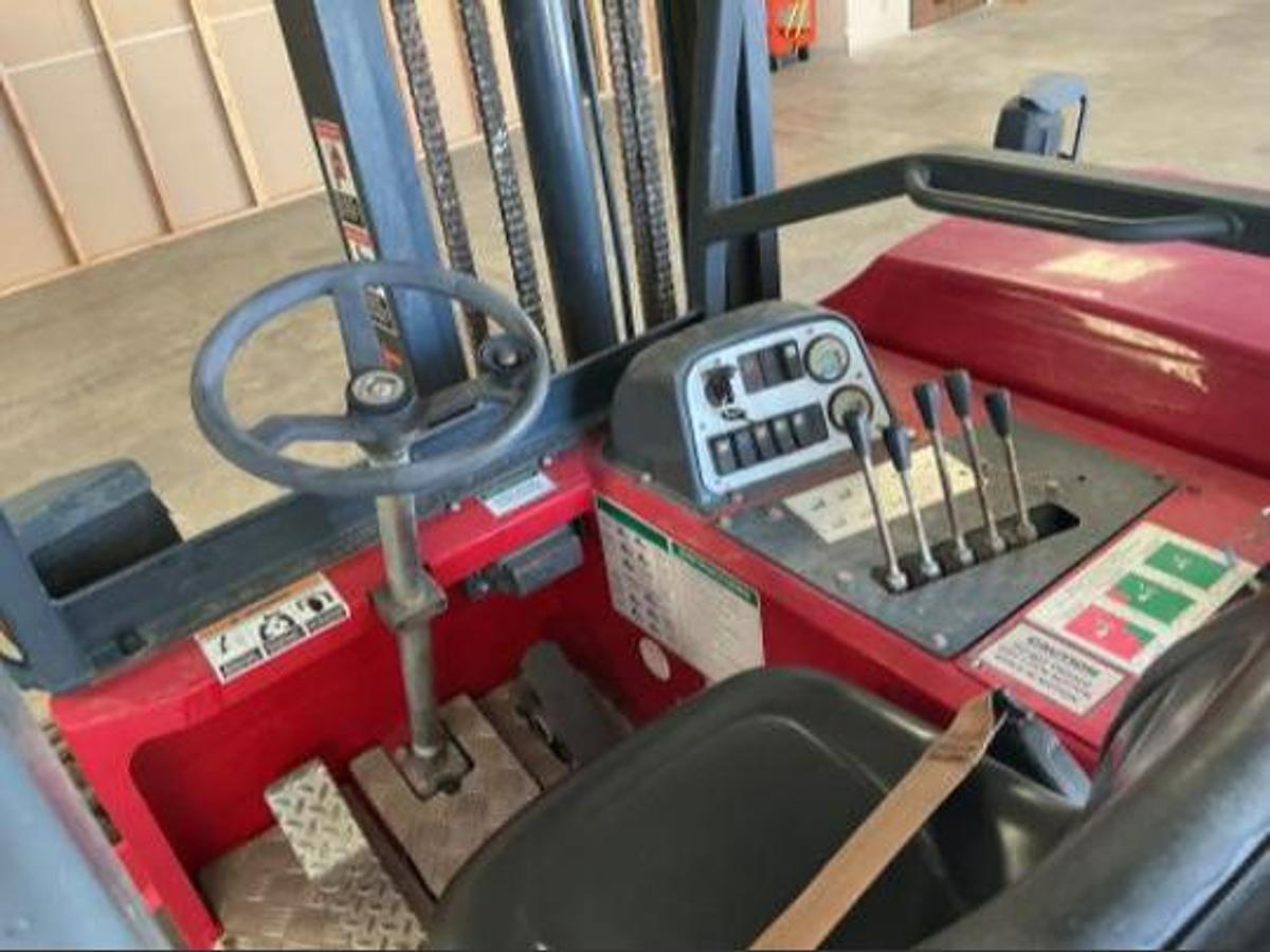 Operator compartment view of 2016 Moffett M8 55.3NX — controls, levers, seat, and safety systems