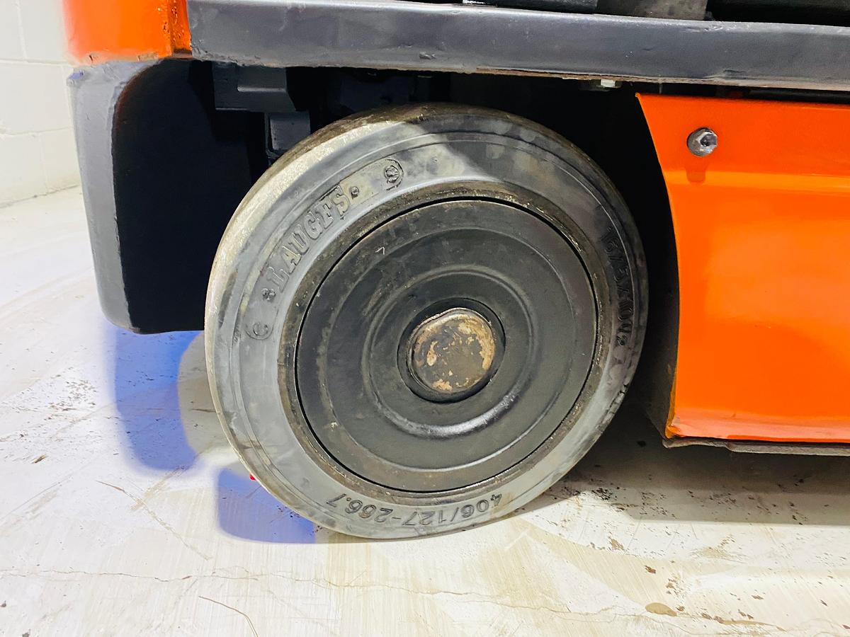 Right cushion steer tire showing wheel hub and CSA spec