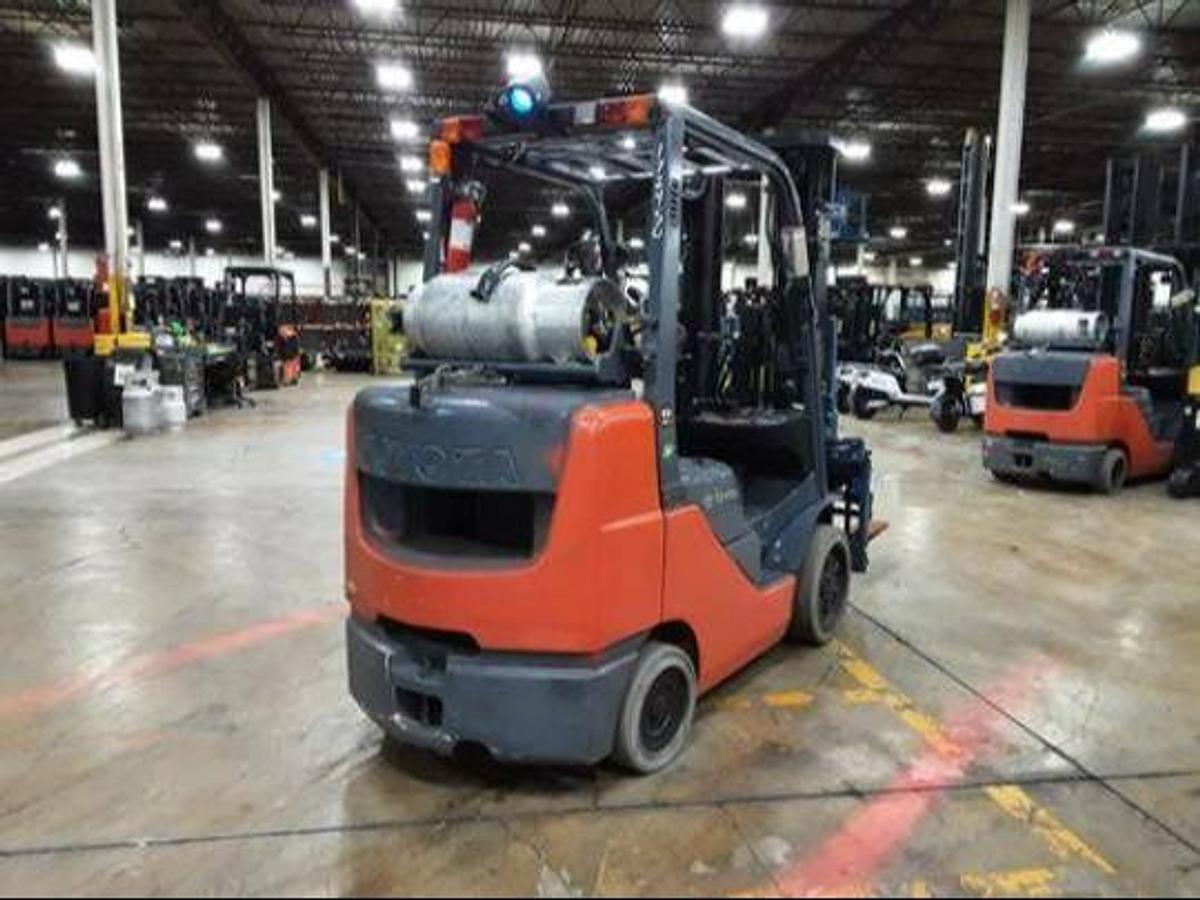 Rear side angle of refurbished 2017 Toyota 8FGCU32 LP gas forklift showing counterweight, rear chassis, and CSA decal during Brampton deployment