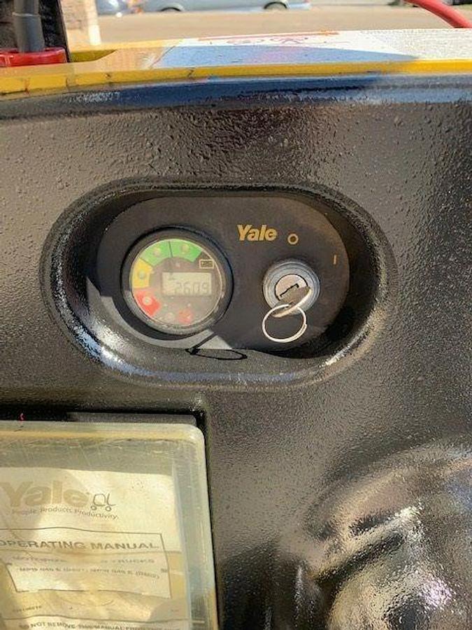 Close-up view of refurbished Yale electric forklift control panel showing key switch, battery indicator, and hour meter during Ontario deployment