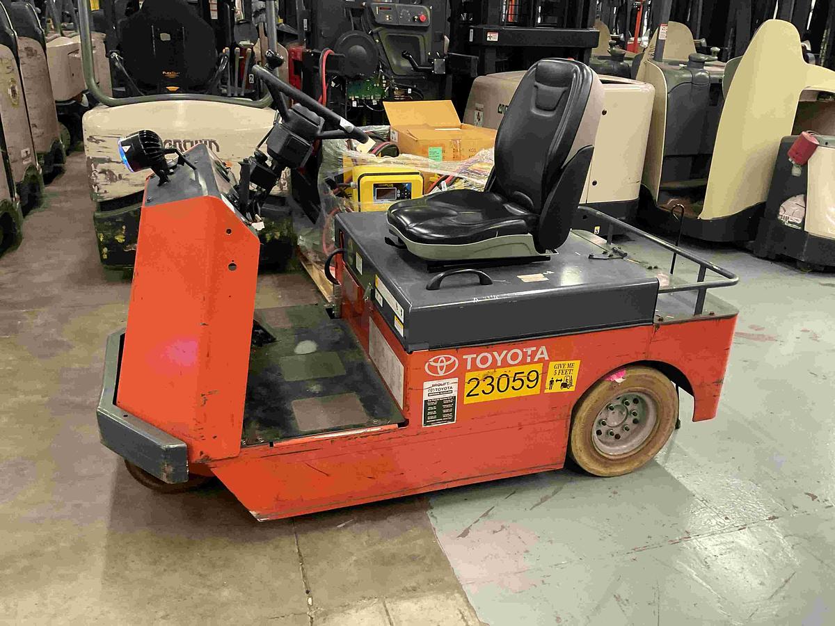“Side view of 2020 Toyota CBT6 sit‑down electric tow tractor showing 48V chassis and operator compartment.”