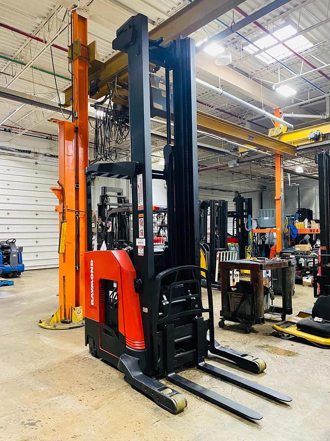 Front angled view showing mast rails and compact chassis profile