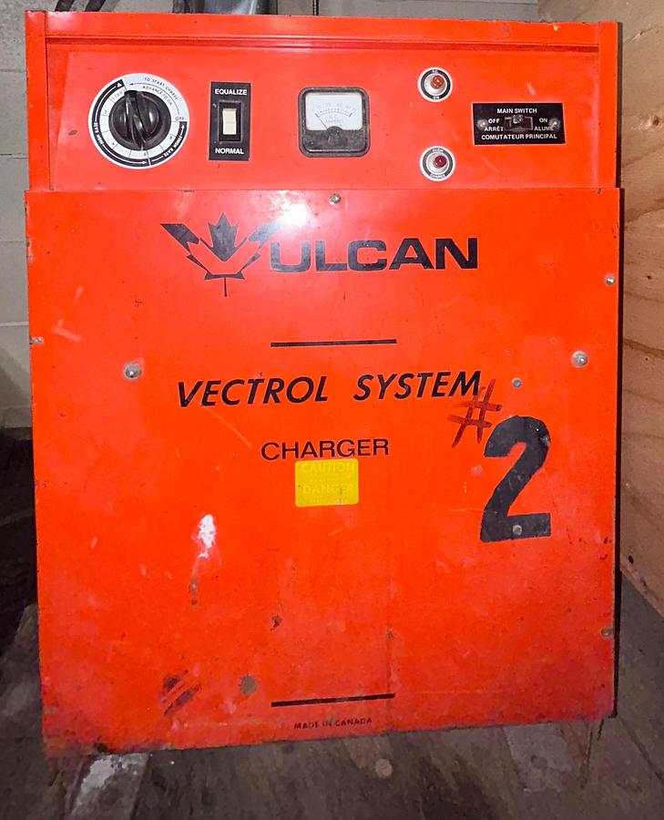 “Vulcan A2T24 60F8 forklift battery charger, 24V 60A lead‑acid unit with UL certification.”
