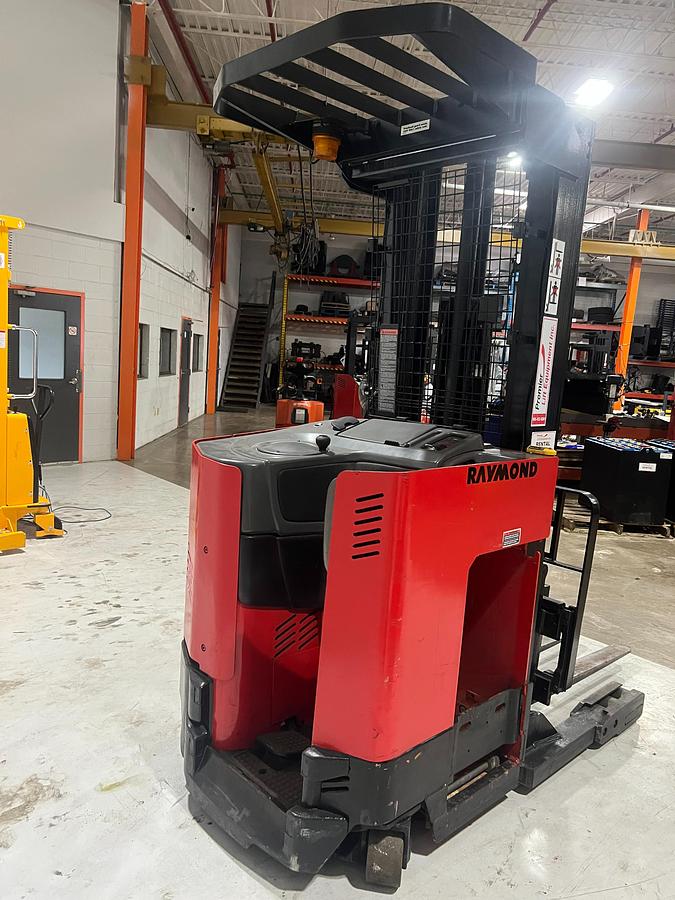 Rear angle view of Raymond EASIR40TT Budget reach truck — counterweight and mast base.