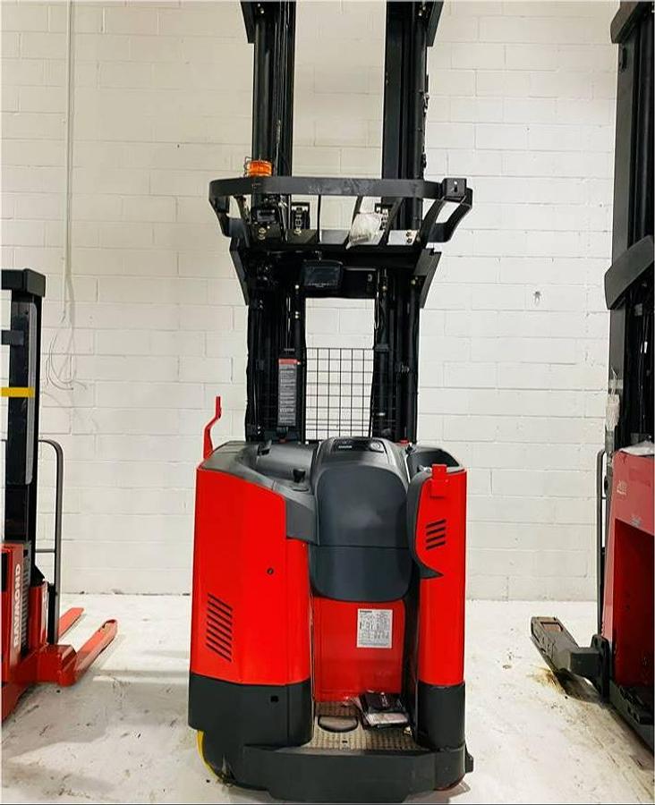 Rear view of refurbished 2022 Raymond 752 DR32TT deep-reach forklift showing mast channels, counterweight, and CSA safety decals during Brampton deployment