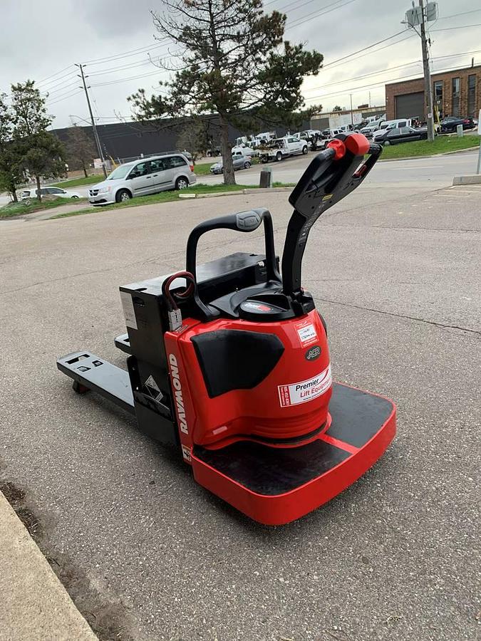 Raymond 8410 – rear angle view – operator deck, drive wheel, and tiller controls – CSA certified rider pallet jack – Brampton ON