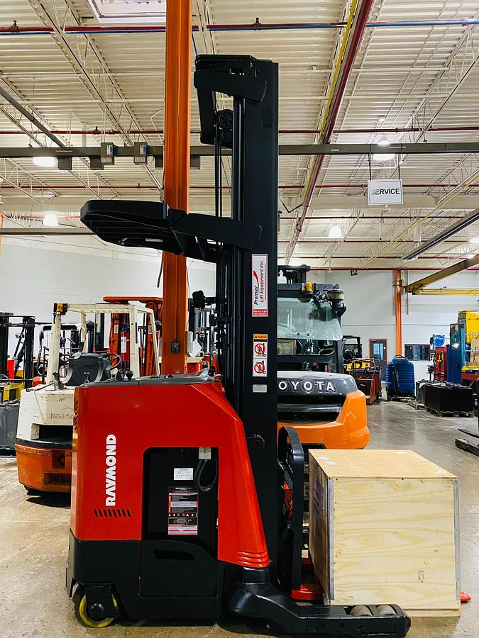 Side view of 2006 Raymond 740‑R35TT, 3,500 lb, 36V electric reach truck, CSA/MOL certified.