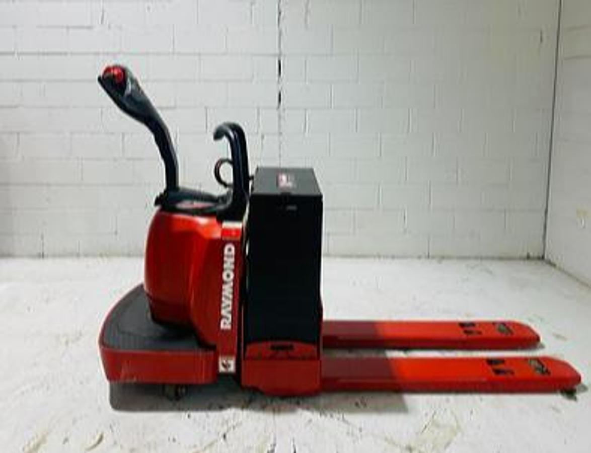 Side view of Budget Raymond 8400 walkie pallet jack, older non‑CSA unit with 27×48 forks.