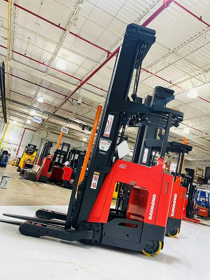 Angled side view of Raymond 752-R45TT freezer reach truck – CSA-certified 4,500 lb electric unit with 348” triple mast, heated platform, and poly tread tires – Premier Lift Equipment Brampton ON