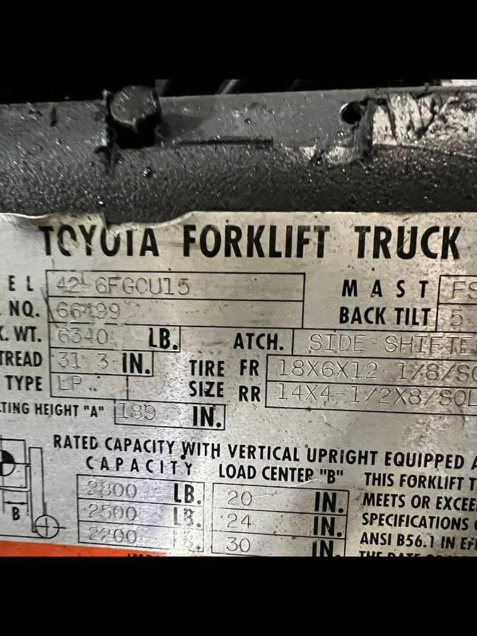Close-up of data tag on Toyota 42-6FGCU15 propane cushion forklift showing serial number, model ID, and CSA compliance stamp – unit staged in Brampton ON