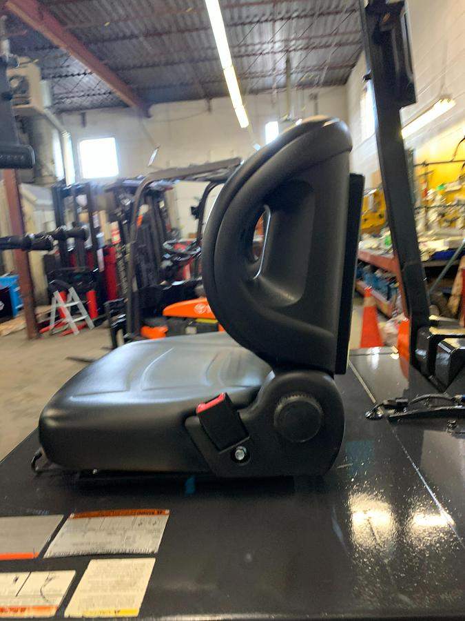 Toyota 8FBCU32 electric forklift — operator seat and controls