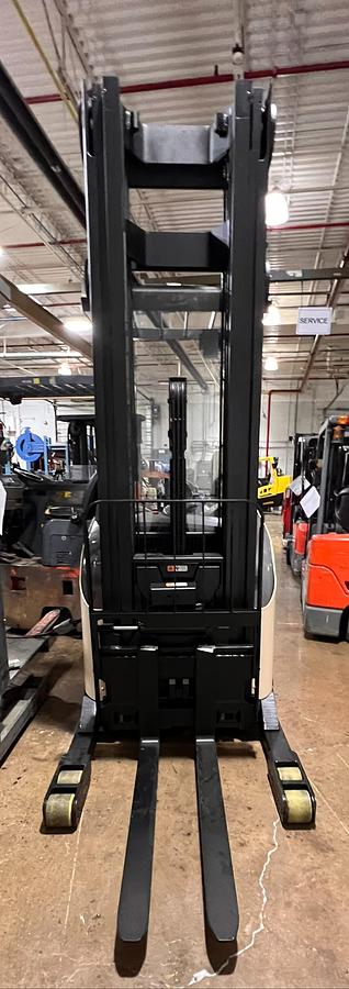 Front view showing forks and 321” mast on Budget Crown reach truck.