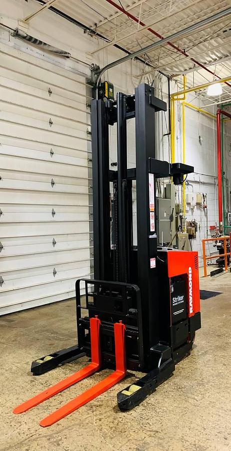 Opposite  Angle Front angled view showing mast rails and compact chassis profile