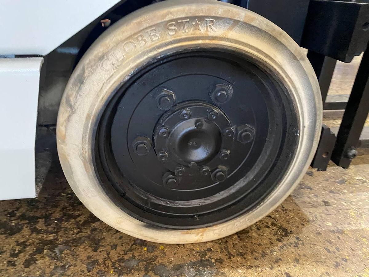 right cushion drive tire showing wheel hub and CSA spec