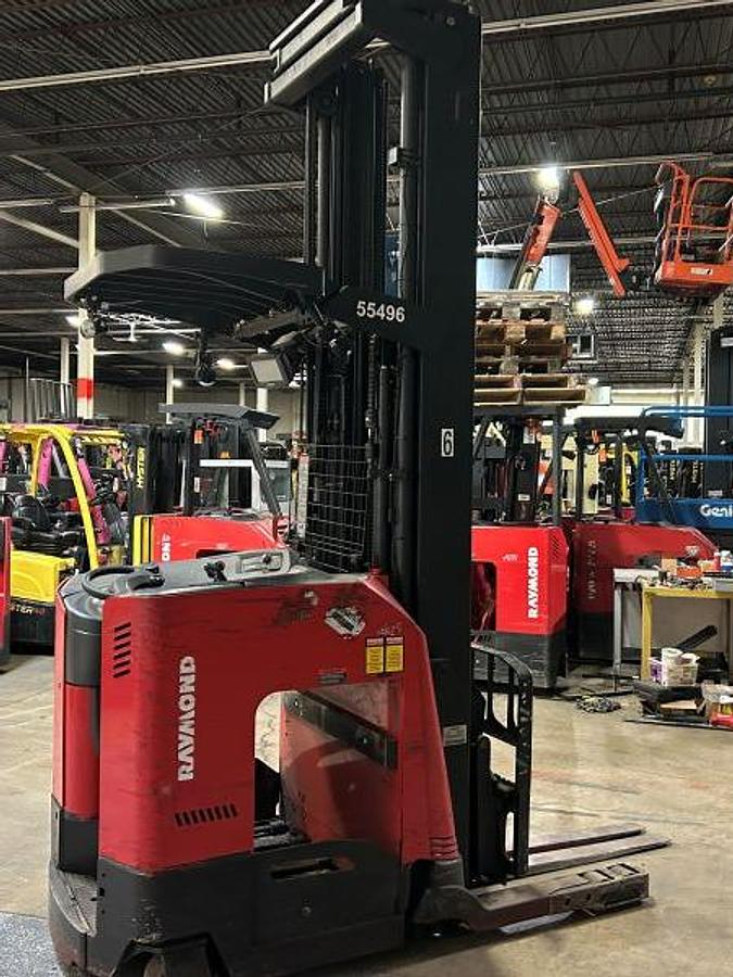 Side view of a 2021 Raymond 750‑DR32TT deep‑reach forklift showing pantograph reach mechanism, 135/302" triple mast, and 4,500 lb capacity.