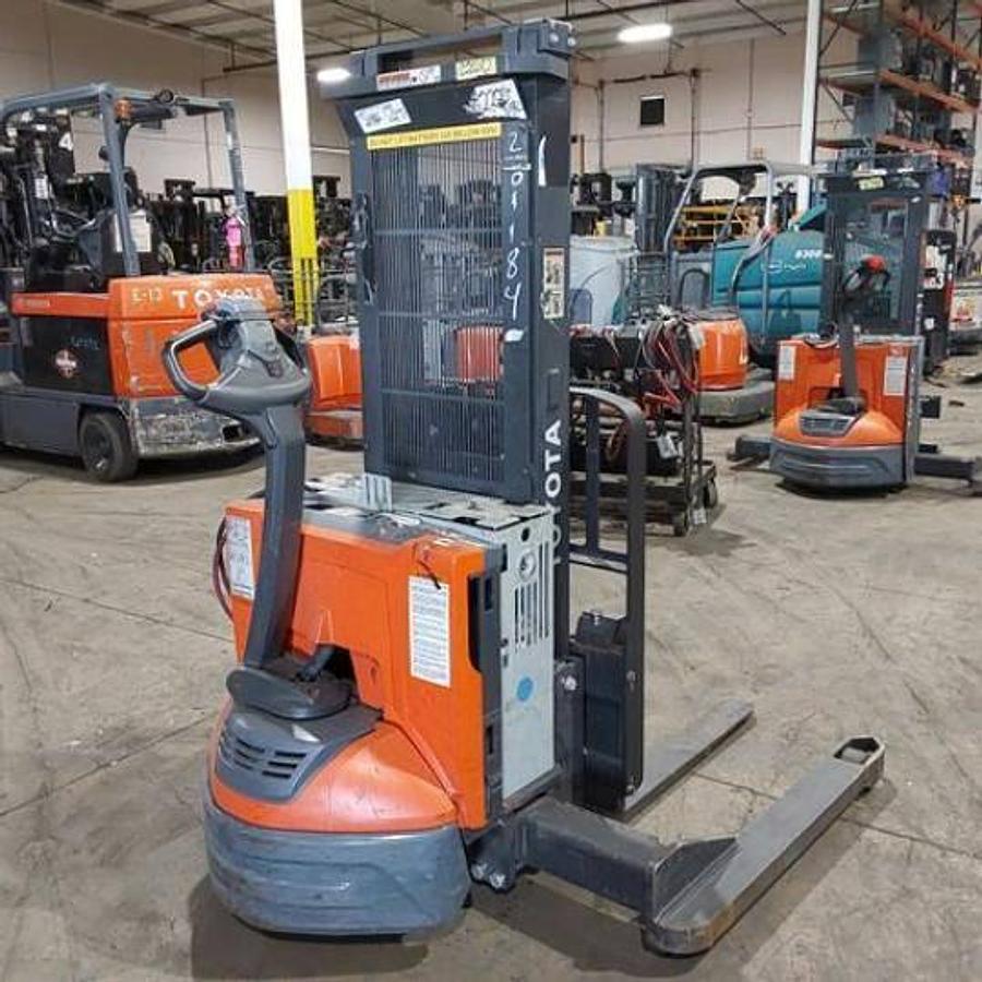 Toyota 8BWS13 – passenger-side rear angle – tiller controls, rear chassis, and safety decals – CSA electric walkie stacker – Brampton ON