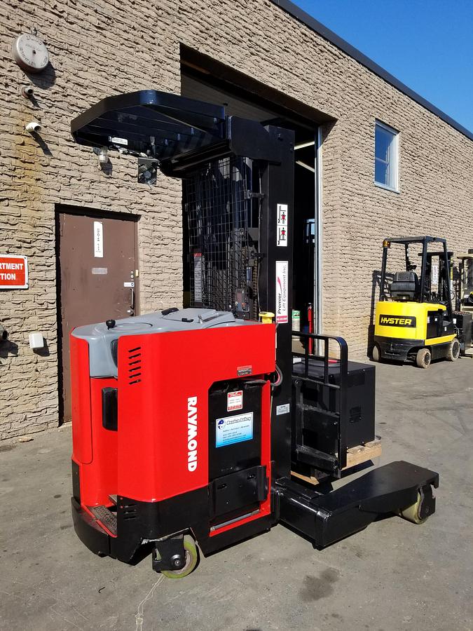 Angled back view of Raymond EASI 4D-R45TT multi-directional electric forklift showing rear chassis, battery compartment, and CSA-certified frame – unit staged in Brampton ON