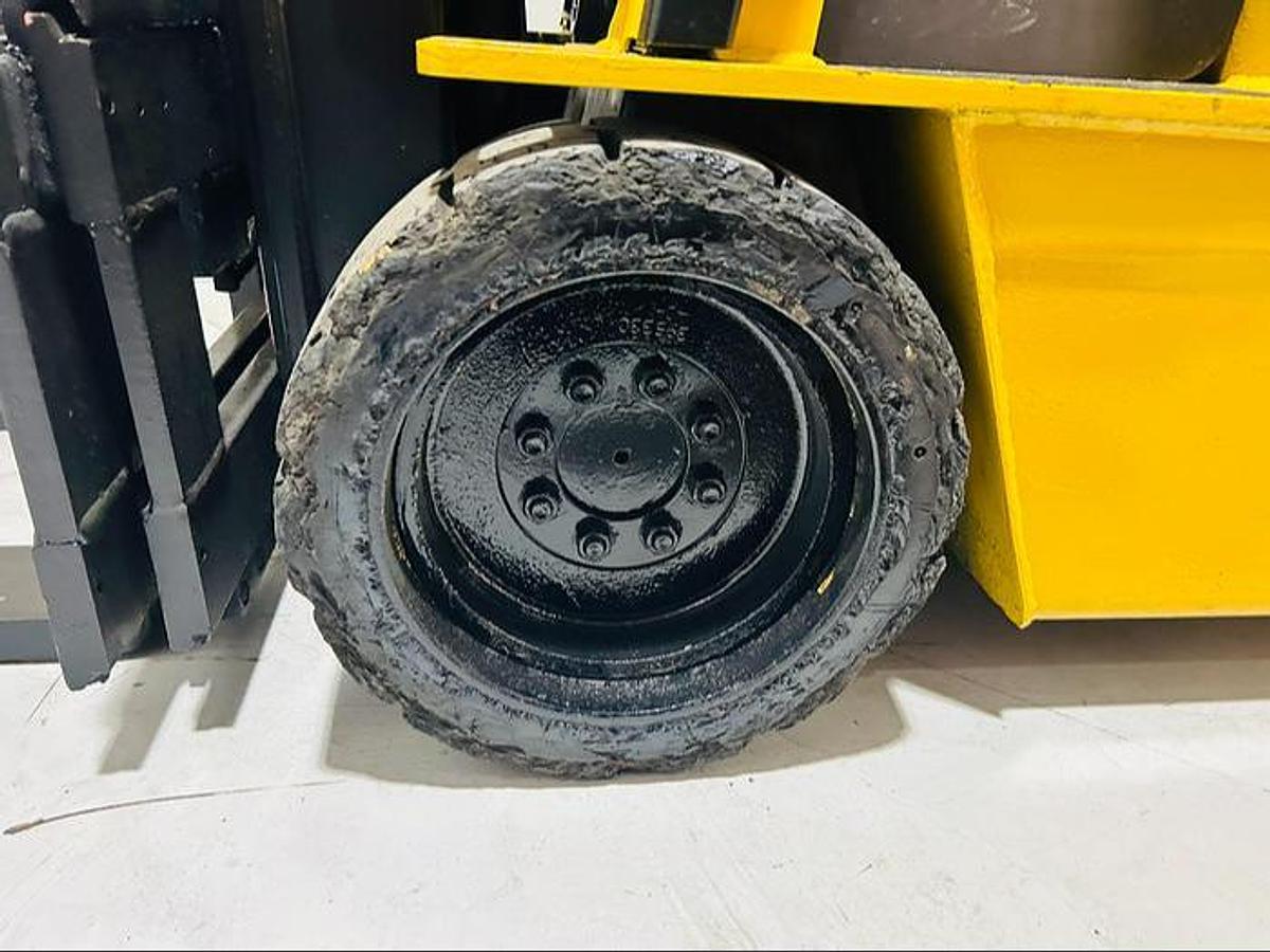 Left drive tire of Budget Caterpillar FC40 older electric forklift, non‑CSA.