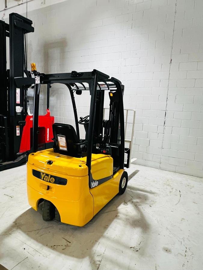 Rear side angle view of 2018 Yale ERP030VTN electric forklift – CSA-certified 3,000 lb 3-wheel chassis with overhead guard, rear counterweight, and freezer-rated seals shown refurbished and sold chassis-only – safety-tagged in Brampton ON – Premier Lift Equipment