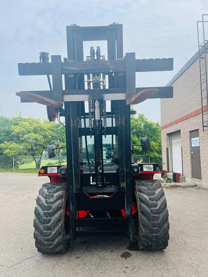 Manitou M40-4 – front view with forks raised – triple mast extended, single-double carriage, CSA safety tags – Brampton ON