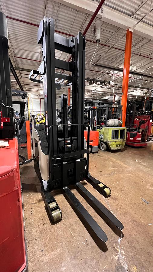 Front angled view showing mast rails and compact chassis profile